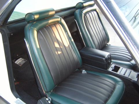 1973 Ford Ranchero - Interior view of a 1973 Ford Ranchero, highlighting the bucket seats and center console.