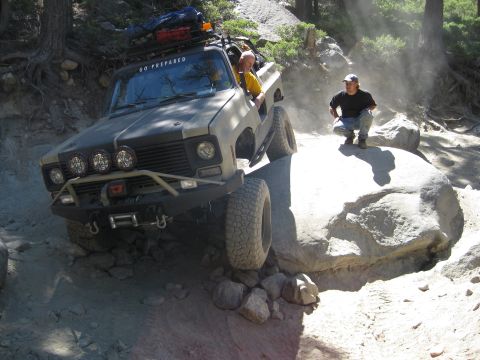 1986 Ford Bronco - This modified 1973 Chevrolet K5 Blazer is navigating a challenging rocky trail.