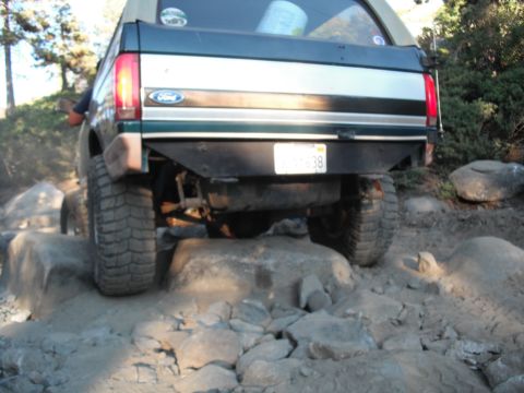 1991 Ford Bronco - This 1991 Ford Bronco is shown off-roading on a challenging rocky terrain.