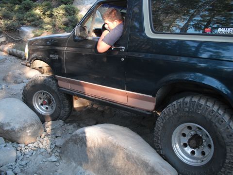 1991 Ford Bronco - This Ford Bronco is shown off-roading on a rocky trail.