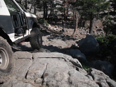1991 Ford Bronco - This 1991 Ford Bronco is shown off-roading on a challenging, rocky path.