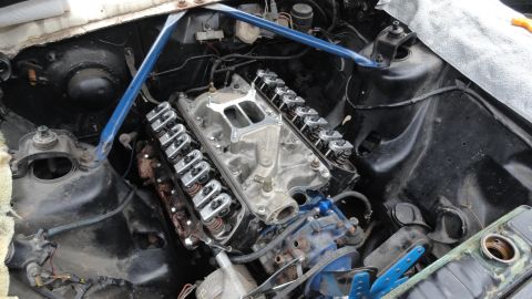 1964 Ford Fairlane - Engine bay view shows a V8 engine with an aftermarket intake manifold and valve covers.