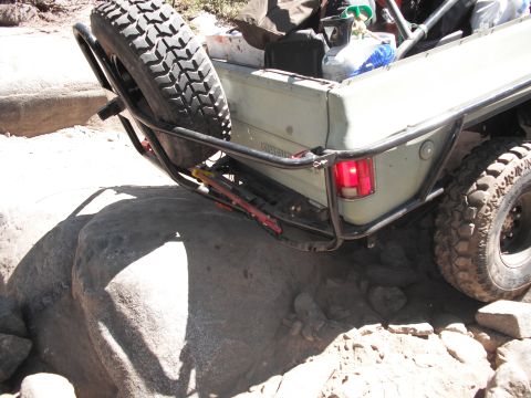1991 Ford Bronco - This vehicle is equipped with a heavy-duty bumper and spare tire for off-road adventures.