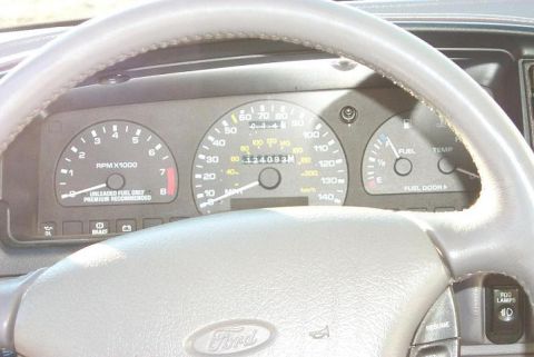 1993 Ford Taurus - The dashboard of a 1993 Ford Taurus shows the odometer reading 124,093 miles.