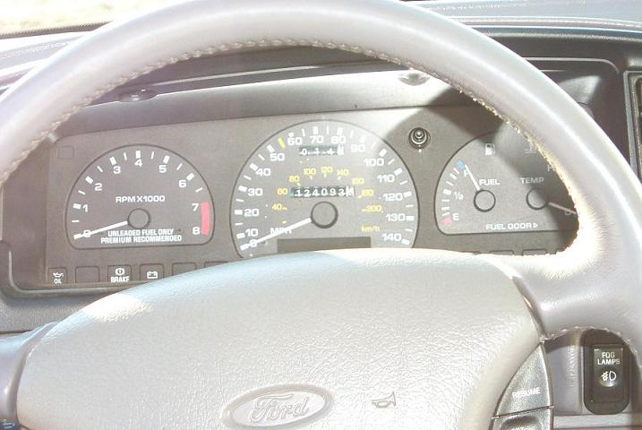 1993 Ford Taurus interior dashboard with odometer showing 124093 miles
