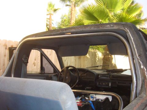 1992 Ford Bronco - 1992 Ford Bronco interior with custom roll cage installed.