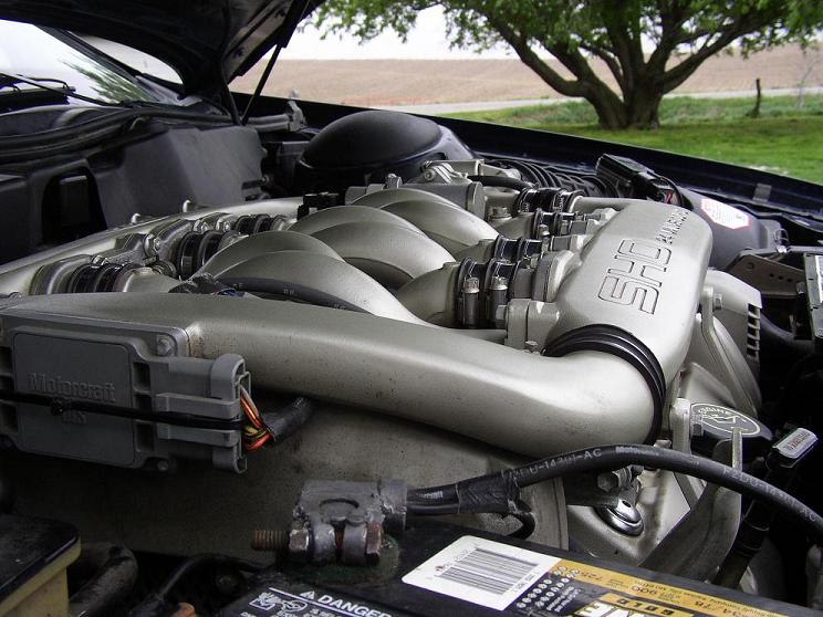1993 Ford Taurus SHO engine bay with V6 engine and "SHO" branding