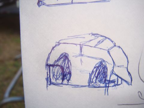 1992 Ford Bronco - A rough sketch depicts the side view of a vehicle, with emphasis on the wheel wells and body shape.
