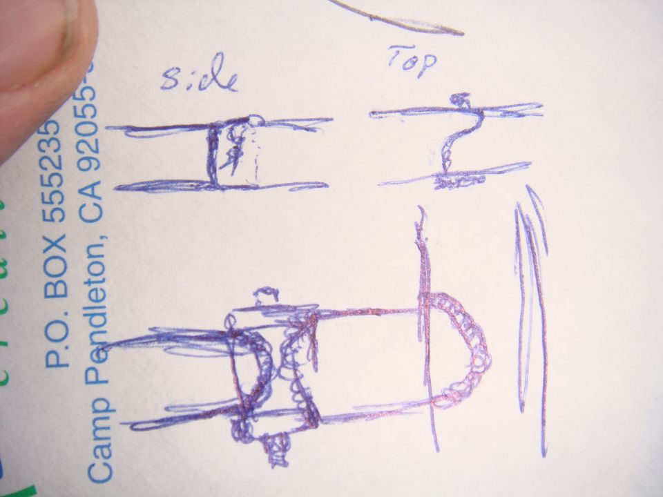 Hand-drawn side and top view doodle of a part on an envelope