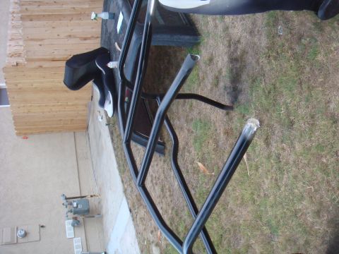 1992 Ford Bronco - Roll cage tubing, likely for a vehicle, is shown outdoors.