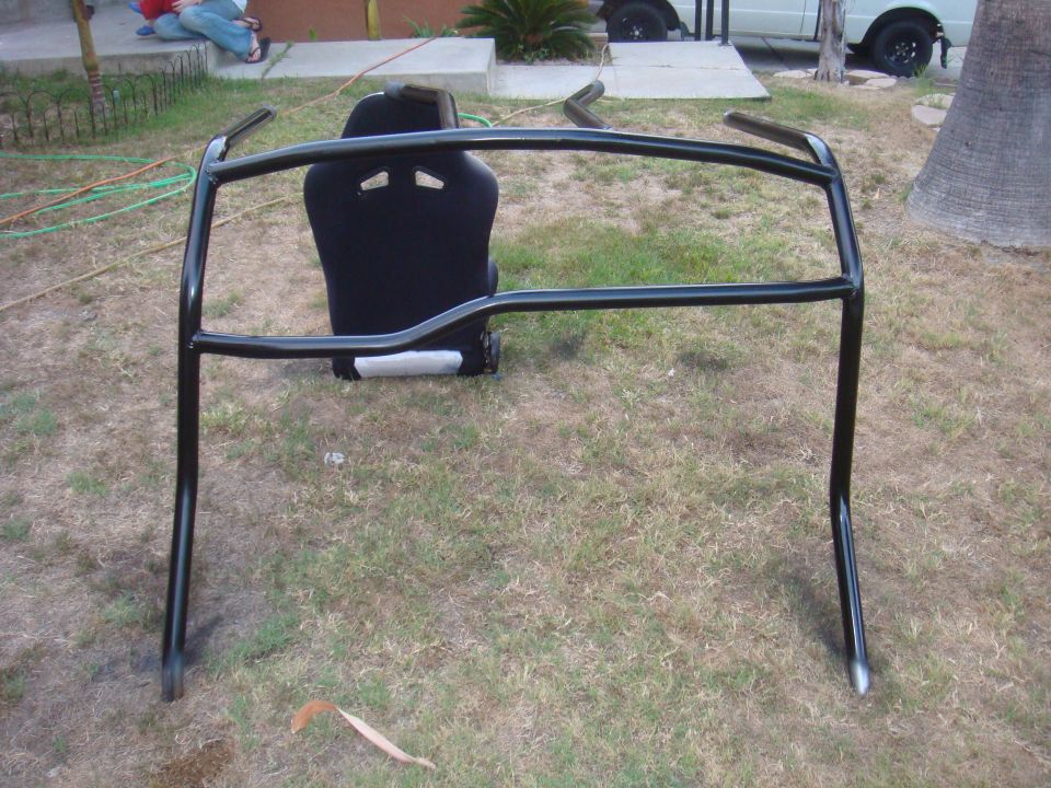 roll cage and racing seat on grass