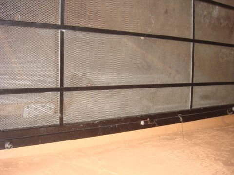 1992 Ford Bronco - A metal cage structure with a black frame and perforated mesh panels is visible.