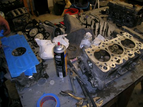 1995 Ford Probe - Engine components are laid out on a workbench, suggesting a rebuild or repair process is underway.
