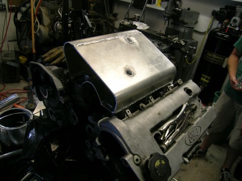 1995 Ford Probe - A Ford engine is shown with a custom intake manifold, and a "Ford" logo is visible on the valve cover.