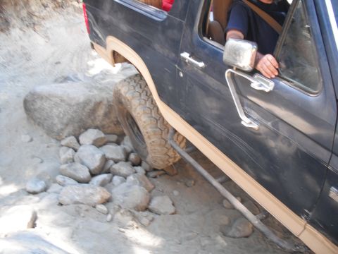 1991 Ford Bronco - This 1991 Ford Bronco is shown navigating a challenging rocky terrain during an off-road excursion.