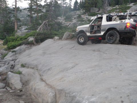 1991 Ford Bronco - This modified 1991 Ford Bronco navigates a challenging rocky terrain.
