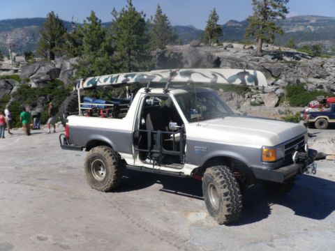 1991 Ford Bronco - This modified 1991 Ford Bronco is equipped for an outdoor adventure, complete with a canoe on its roof rack.