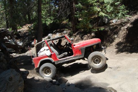 1993 Jeep Wrangler - This 1993 Jeep Wrangler tackles a challenging rocky trail, its off-road capabilities.