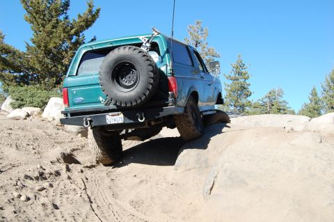 1993 Jeep Wrangler - This 1993 Ford Bronco navigates a rocky trail, its off-road capabilities.