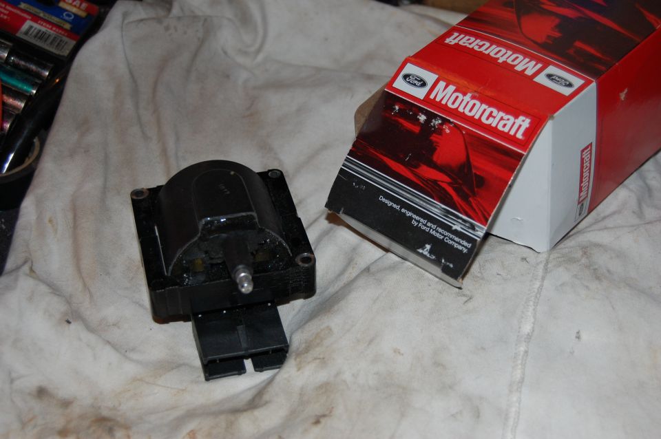 Motorcraft ignition coil out of its box on a rag
