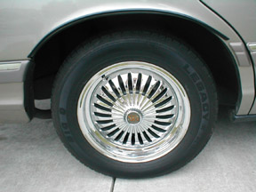 1994 Ford Crown Victoria - Close-up on the chrome. Notice the Big O Legacy Tour Plus tires. My dad owns a Big O dealership in Modesto, you'll always get excellent ser…