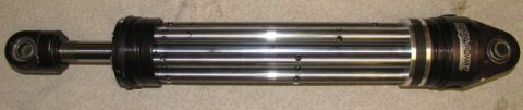 1984 Ford Bronco - A King Shocks brand shock absorber is pictured, likely for off-road or performance vehicle use.