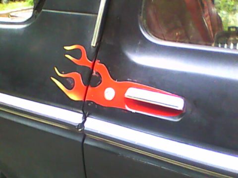 1978 Ford Bronco - 1978 Ford Bronco door with custom flame decal and chrome trim.