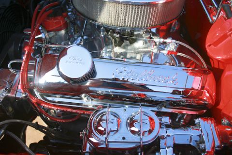 1959 Ford Ranchero - Close-up of a polished Ford engine, likely from a 1959 Ford Ranchero, Edelbrock valve covers and a dual carburetor setup.