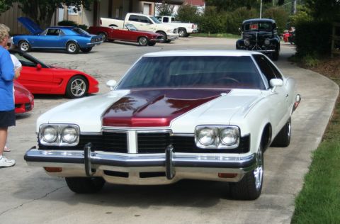 1976 Ford Ranchero - Front view of a 1976 Ford Ranchero at a car show, with other vehicles present.