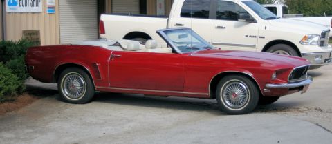 1976 Ford Ranchero - Classic red 1969 Ford Mustang convertible with a white interior.