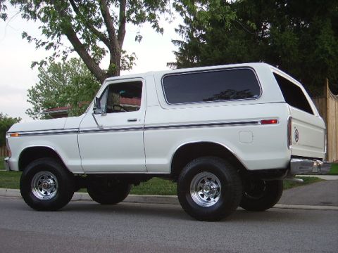 1978 Ford Bronco - This 1978 Ford Bronco is shown from its side profile, parked on a residential street.