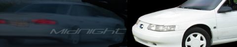 1993 Ford Taurus - A white 1993 Ford Taurus is shown from the front quarter, juxtaposed with the rear of a dark sedan bearing the word 'Midnight'.