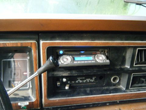1981 Ford E350 - Dashboard of a vehicle with a Sony stereo and climate controls, showing the interior.