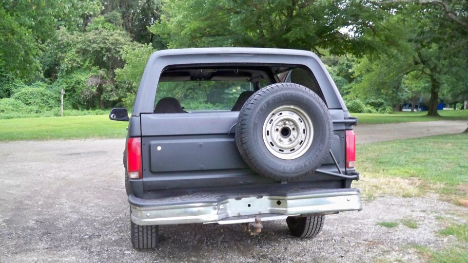 1994 Ford Bronco rear view with spare tire mounted on tailgate