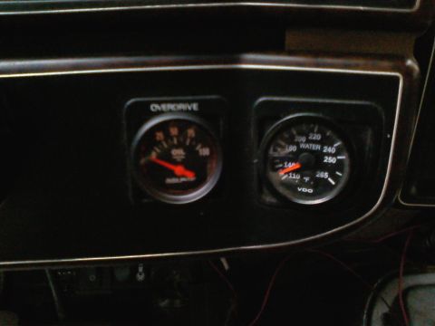 1990 Ford Bronco - Close-up of the dashboard showing oil pressure and water temperature gauges.