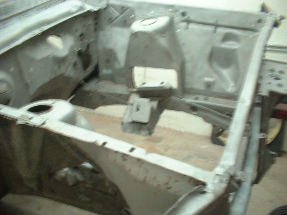 Engine bay of a car under restoration