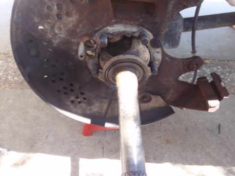 1994 Ford Bronco - This photo shows a vehicle's wheel hub assembly, likely during a repair or maintenance process.