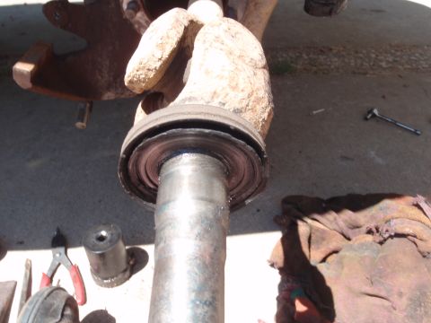 1994 Ford Bronco - Close-up of a worn balljoint assembly, suggesting a need for replacement.