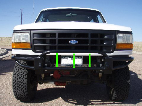 1994 Ford Bronco - Front view of a 1994 Ford Bronco, a prominent black grille and an aftermarket bumper.