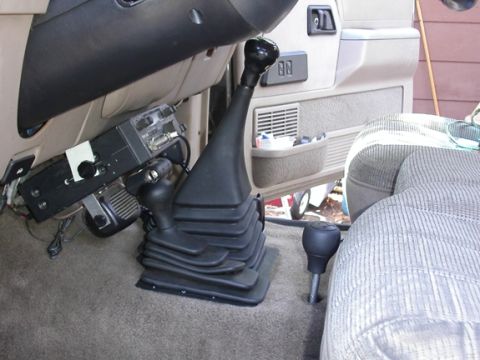 1990 Ford Bronco II - Original floor shifter operates the rear t-case as if it were stock, the doubler unit is shifted via the knob in between the stock shifter…