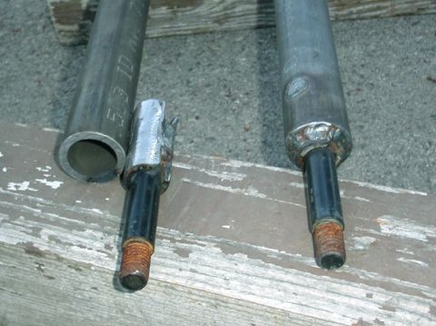 1990 Ford Bronco II - The end of the stock arm is cut off and prepped to be welded into the end of the DOM tube (shown next to a finished end)