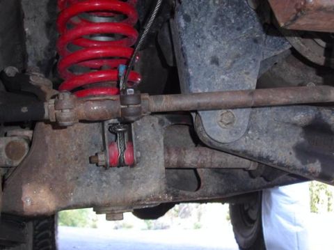 1990 Ford Bronco II - This shows the cable attached to the axle. It also shows where I had to widen the window where the axle shaft passes through the beam using…