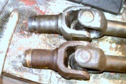 1990 Ford Bronco II - Without the limit cable, the suspension has enough droop to bind the center axle u-joint. Some quick work with a grinder... problem solved.