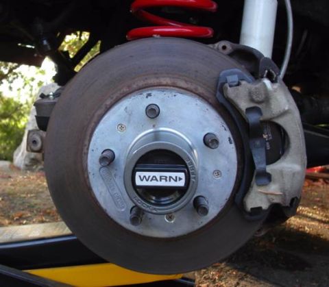 1990 Ford Bronco II - Warn manual locking hub, shown secured to the rotor using small screws (keeps the hub from coming off with the tire). This is the stronger…