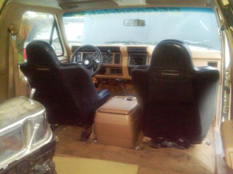 1986 Ford Bronco - Interior view of a 1986 Ford Bronco, highlighting the seats and dashboard.