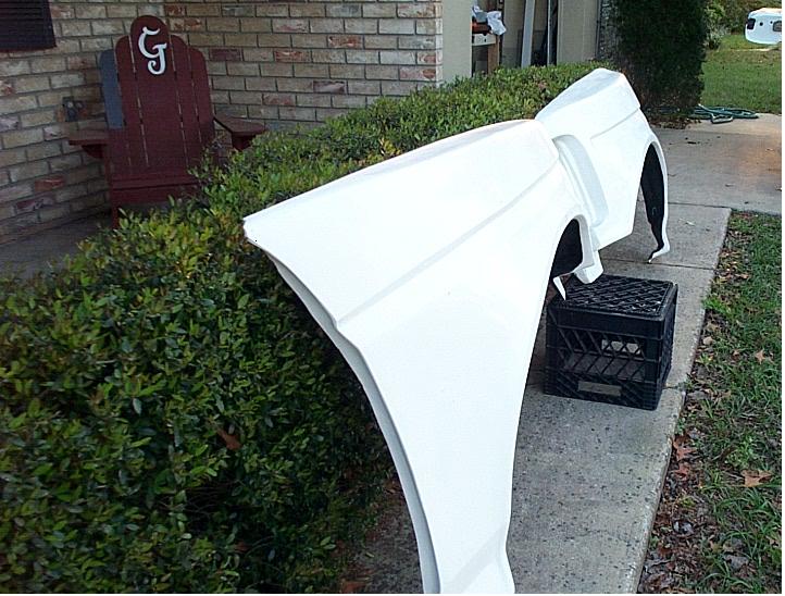 Fiberglass fenders made by Hannemann 92-96 body style. 4" bulge and 2" wider wheel well opening.