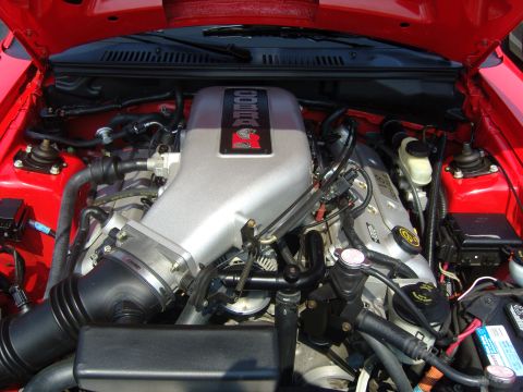 2007 Ford Mustang - Close-up of a Ford Mustang Cobra engine, highlighting the distinctive intake manifold and engine components.