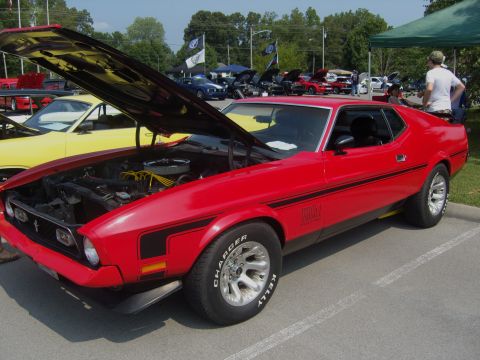 2007 Ford Mustang - A red 1971 Ford Mustang Mach 1 is displayed at an outdoor car show.