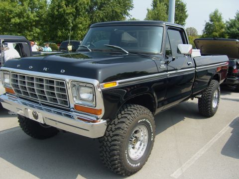2007 Ford Mustang - This lifted 1979 Ford F-150 pickup truck is parked outdoors.