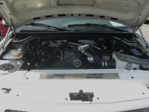 2007 Ford Mustang - Customized engine bay with a prominent black intake and JLP Racing branding visible.